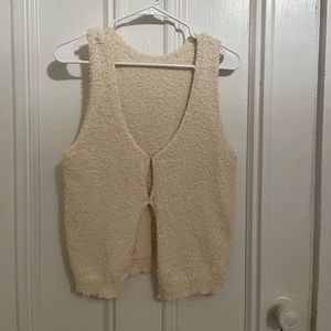 Knit clasp-front vest